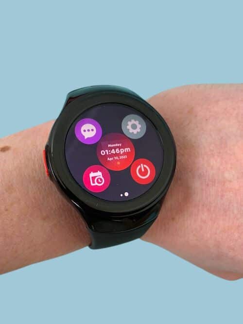 MGMove watch on wrist with circle icons on watch face