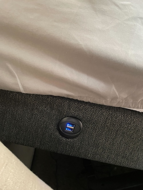 Two USB ports on an adjustable base with a mattress on top