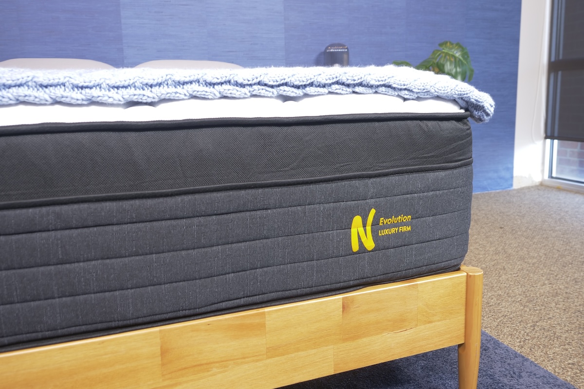 Nolah Evolution 15″ mattress on a wooden bed frame