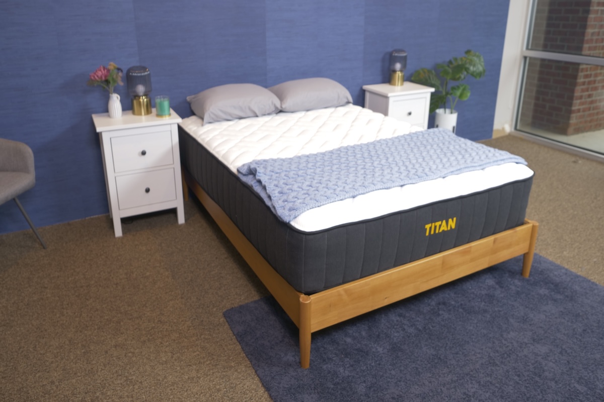 Titan Plus Mattress on a wooden bed frame
