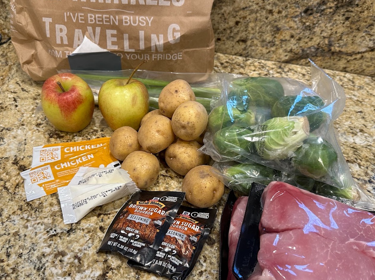 The ingredients for the brown sugar bourbon pork chops, potatoes, and Brussels sprouts